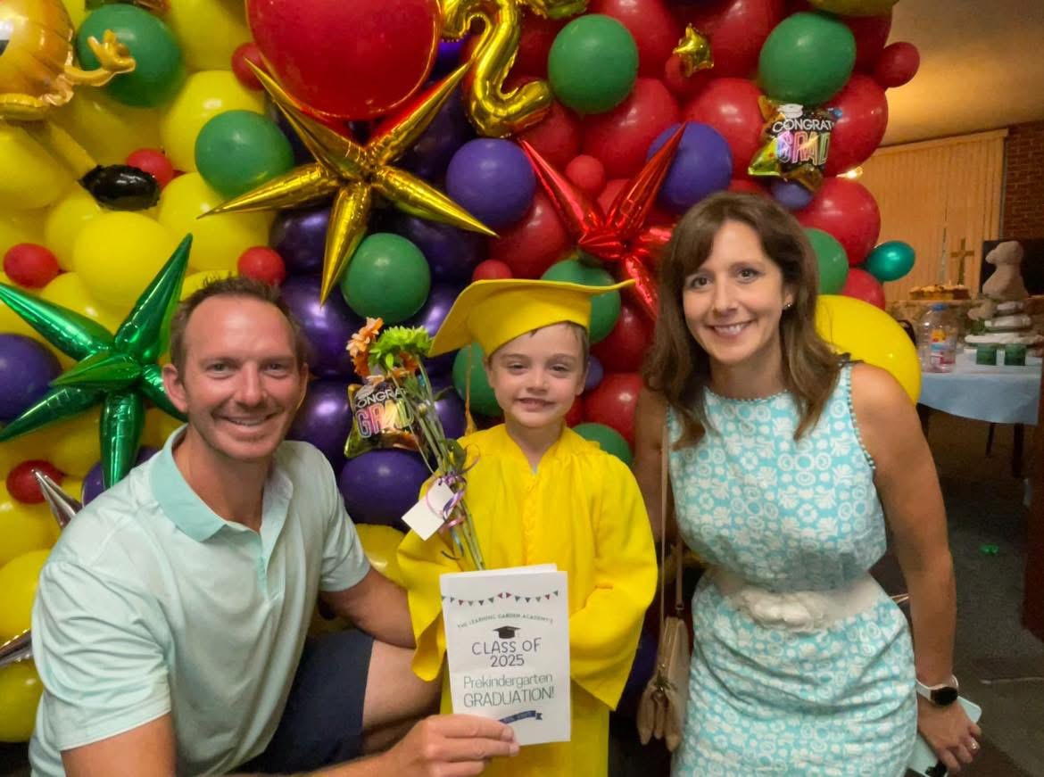 A Learning Garden graduate celebrating an important milestone with family